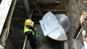 Track sawing concrete wall